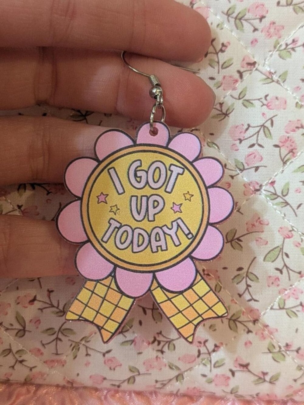Handmade I got up today earrings with pink flower design and yellow ribbon